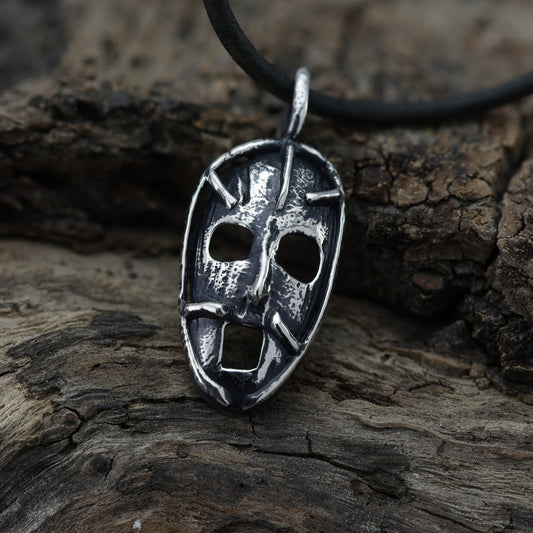 Close-up view of the 'Prison of the Mind' sterling silver pendant, showcasing intricate broken wire design symbolizing paths to understanding and freedom