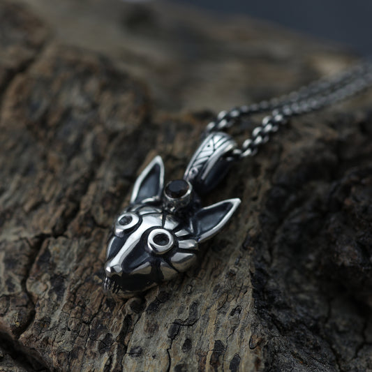 Close-up of Sterling Silver Fox Face Pendant with gleaming Smoky Quartz gemstone.