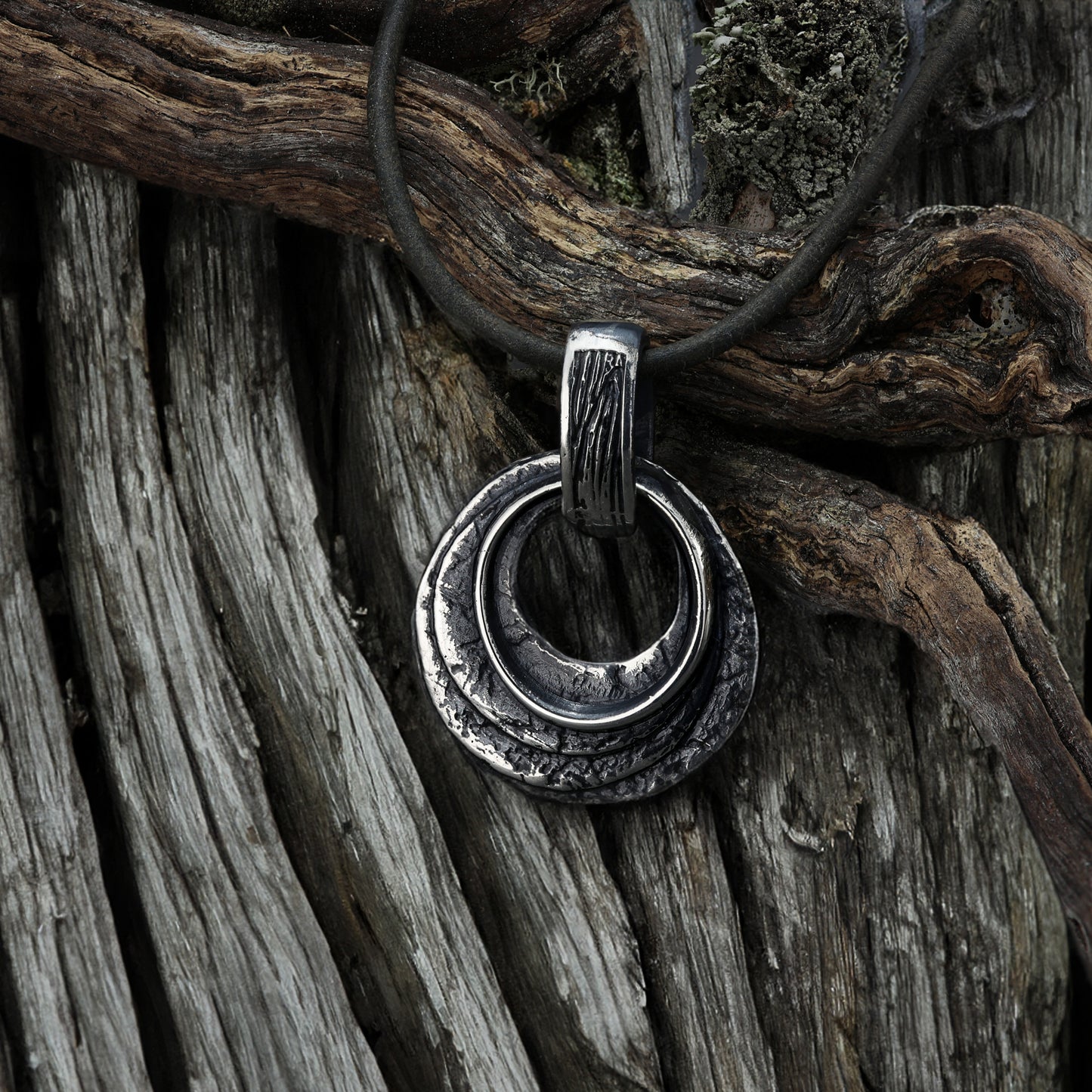 Find your Pagan and Viking connection with this round sterling silver pendant, online for you.