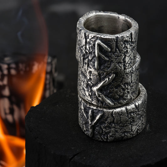 Close-up of Sterling Silver Elder Futhark Rune Ring on a dark background.