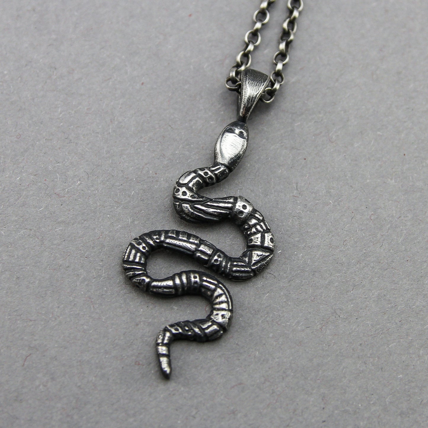 ornamented handcrafted silver snake pendant