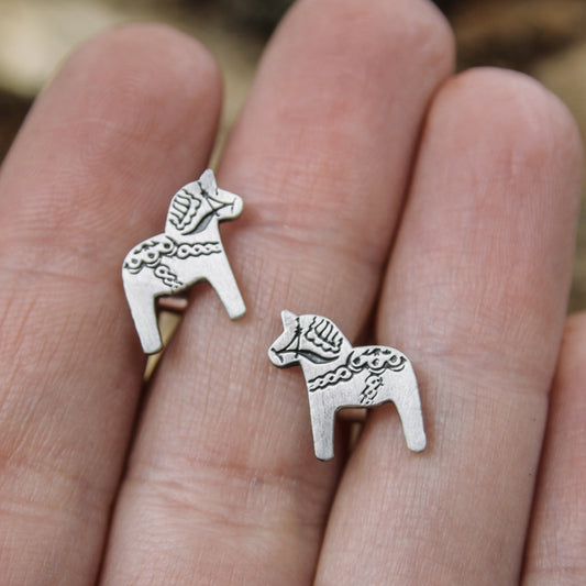 Dala horse earrings.