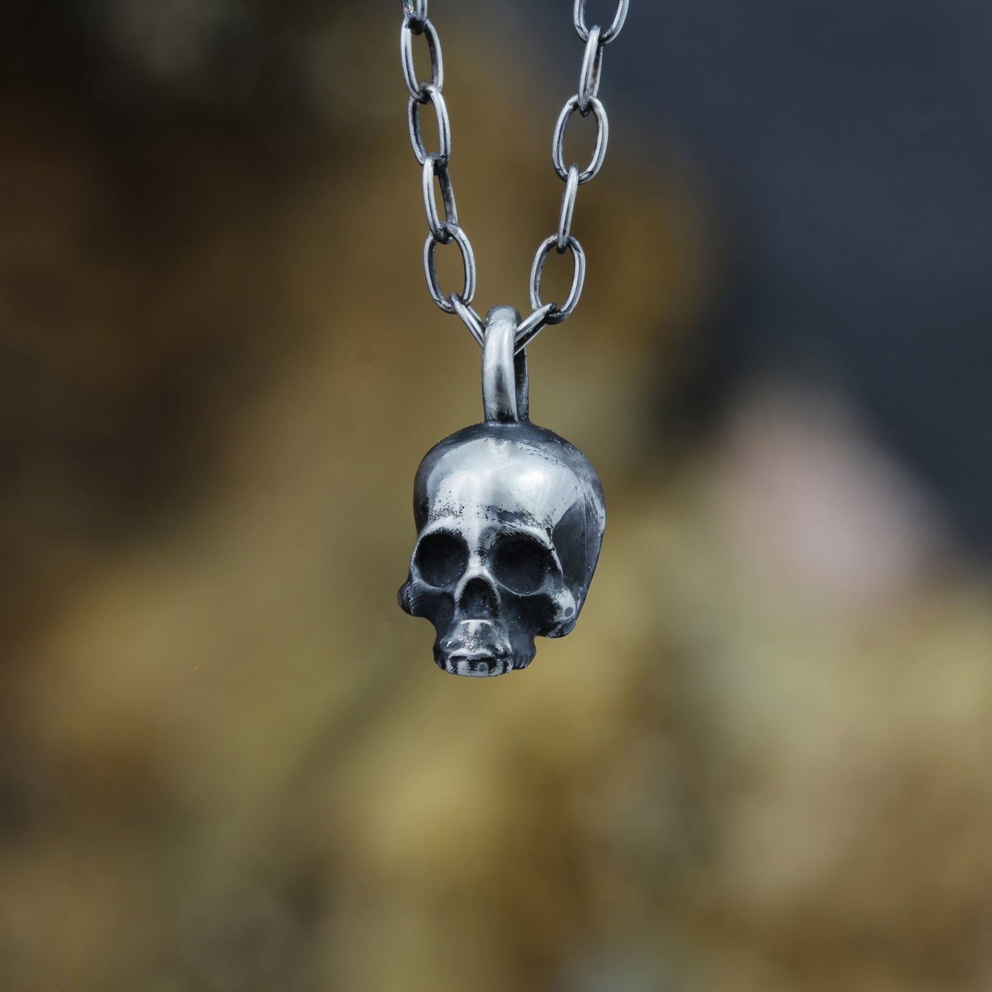 Anatomically correct skull pendant.