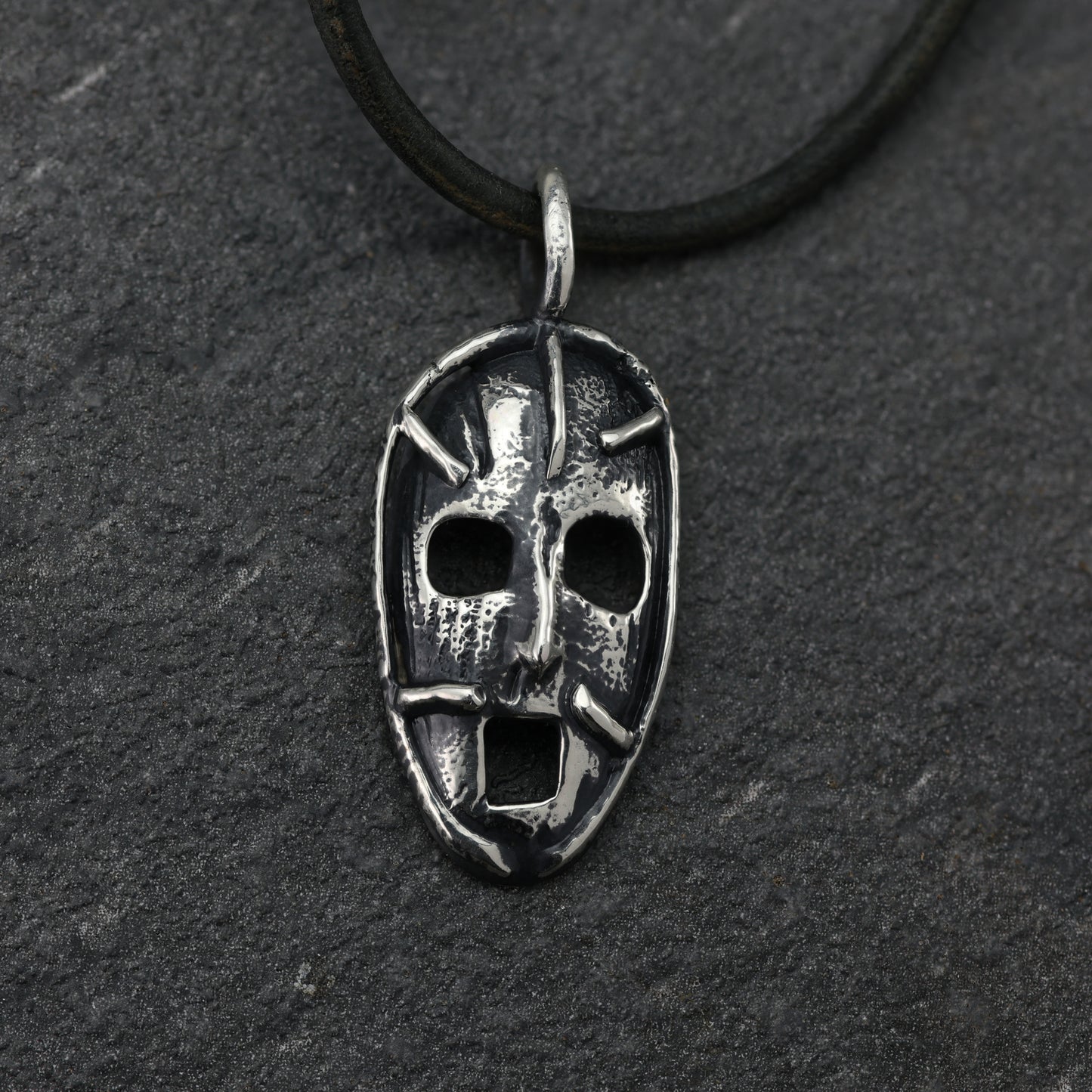 Overhead shot of the 'Prison of the Mind' pendant