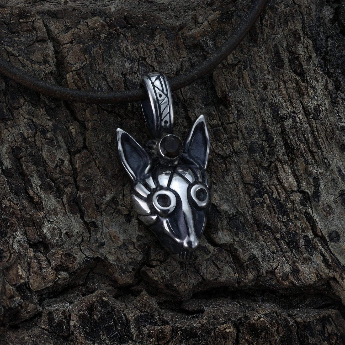 Fox pendant captured under soft lighting to highlight its shine.