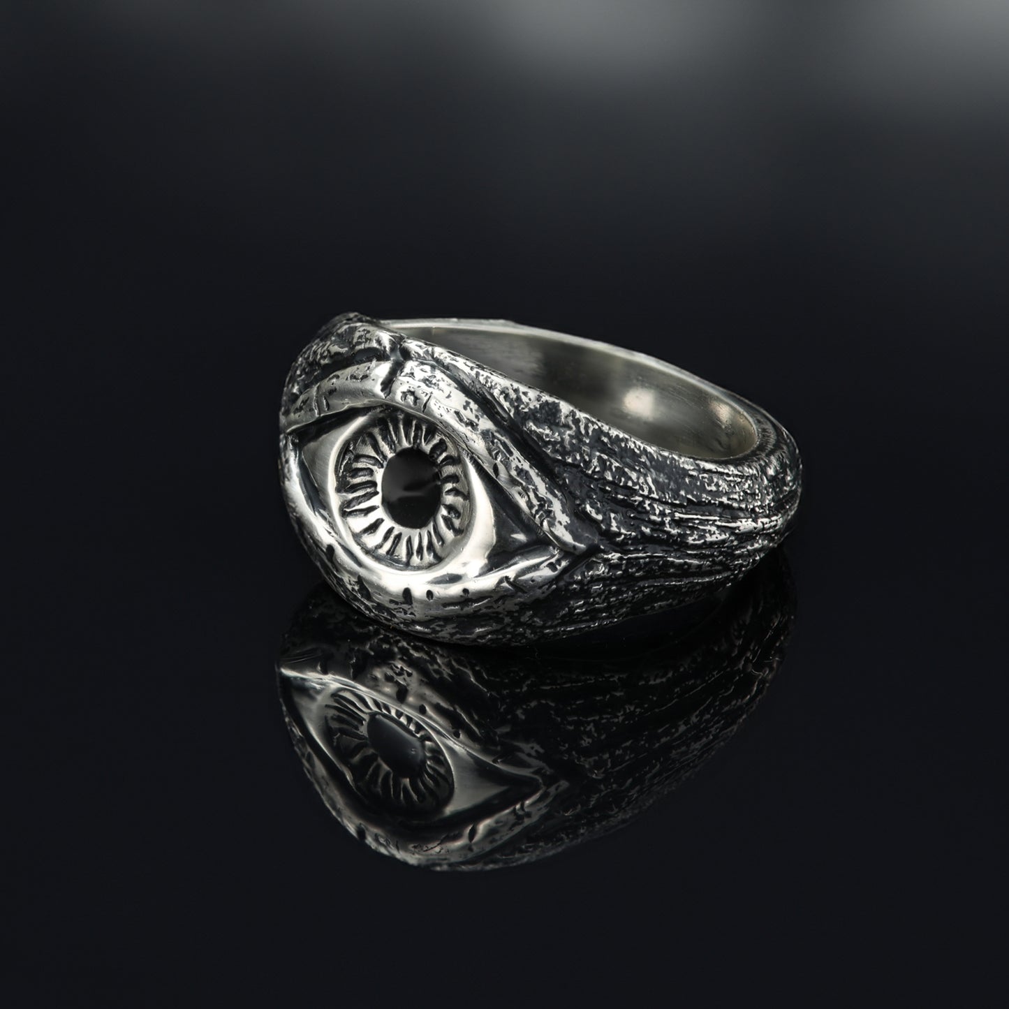 Side profile of the Evil eye ring showcasing textures.