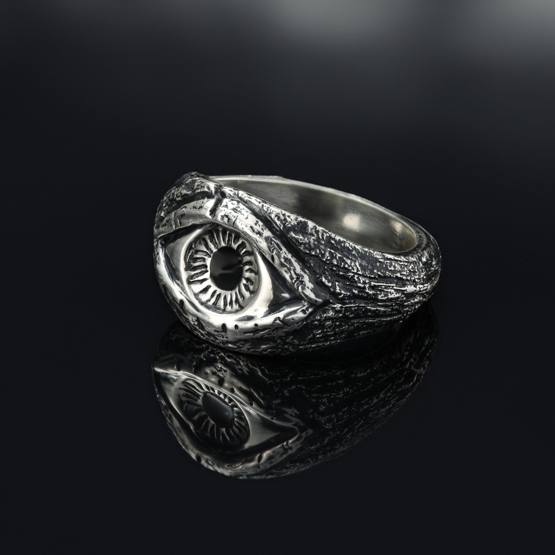 Side profile of the Evil eye ring showcasing textures.