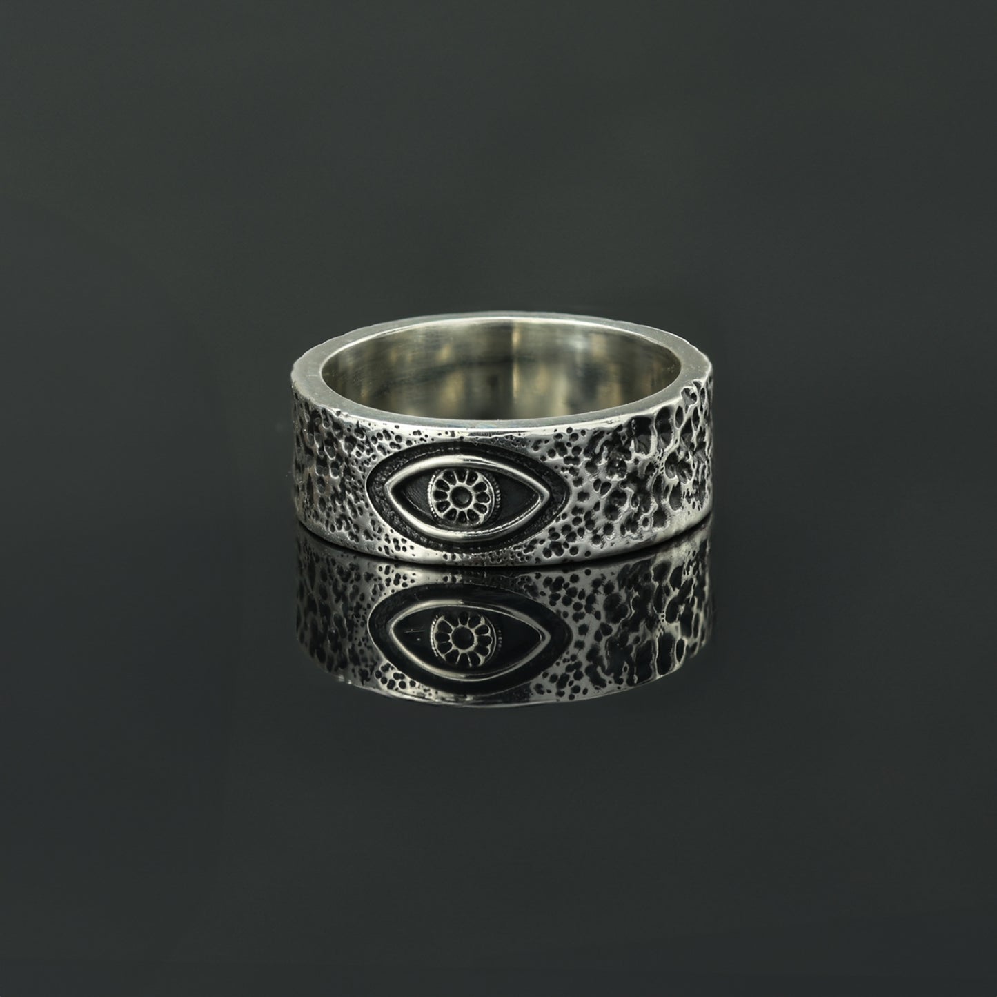 Sterling silver eye band ring.