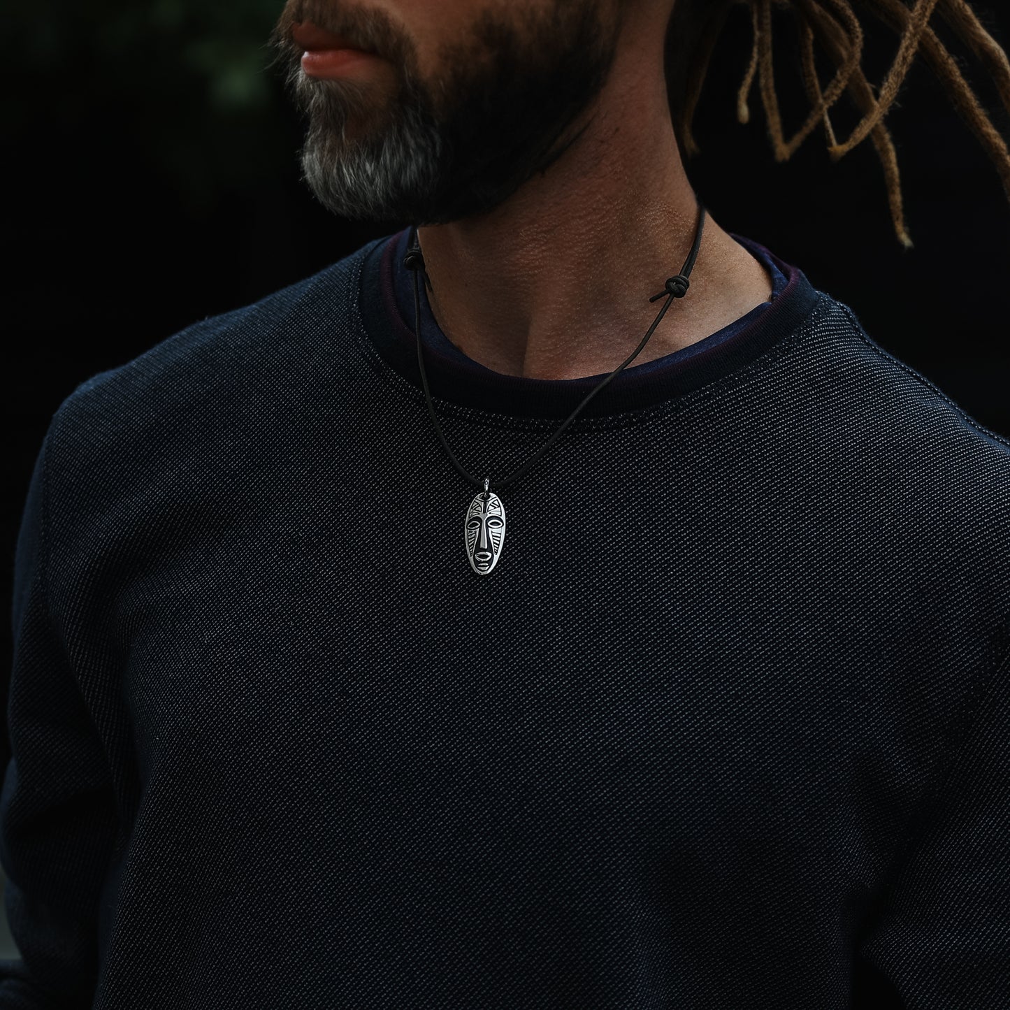 Unique handmade sterling silver Warrior Mask pendant reflecting rustic Viking and tribal art influences.