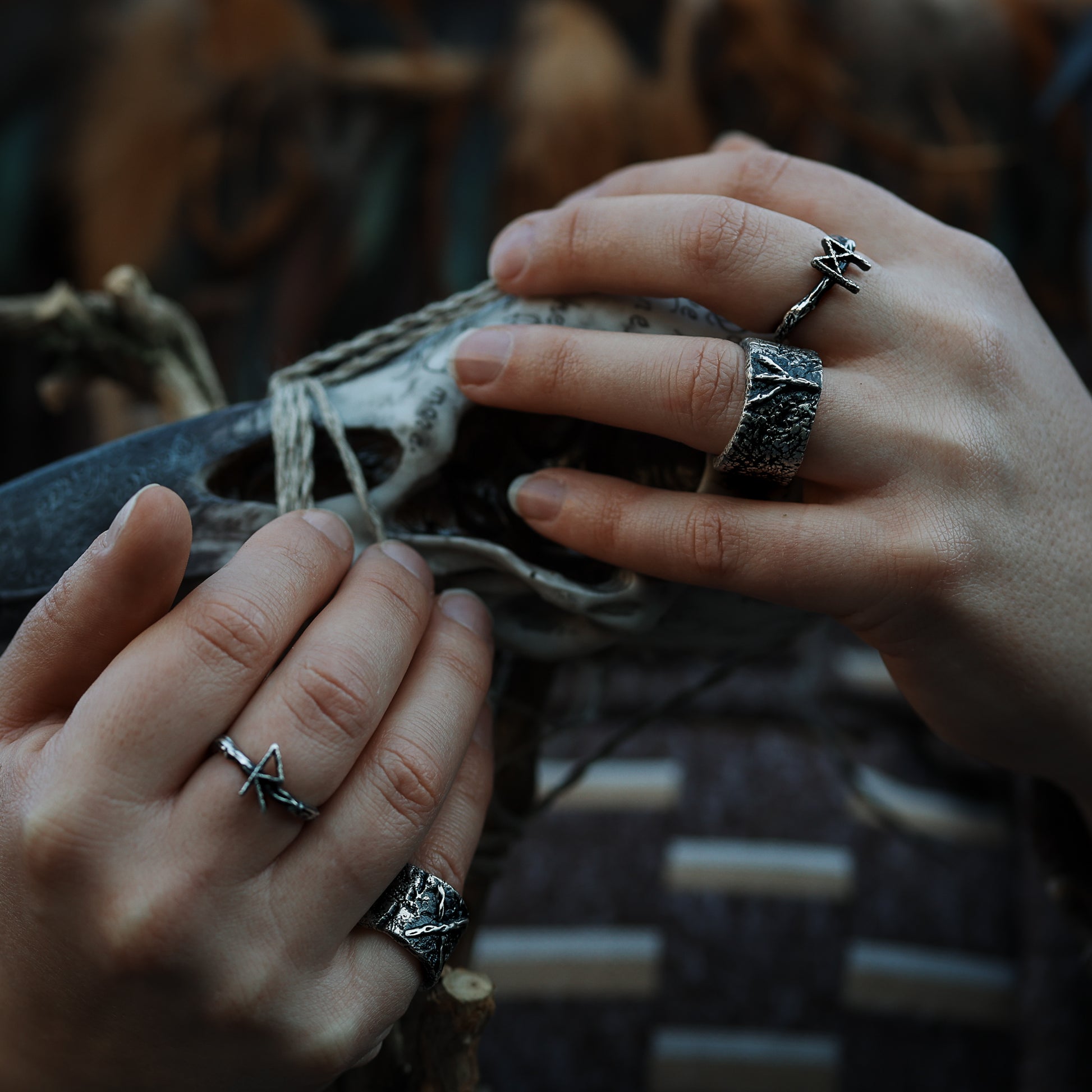 Elder Futhark Rune Ring displayed in natural lighting for optimal clarity, beautifully worn on a hand.