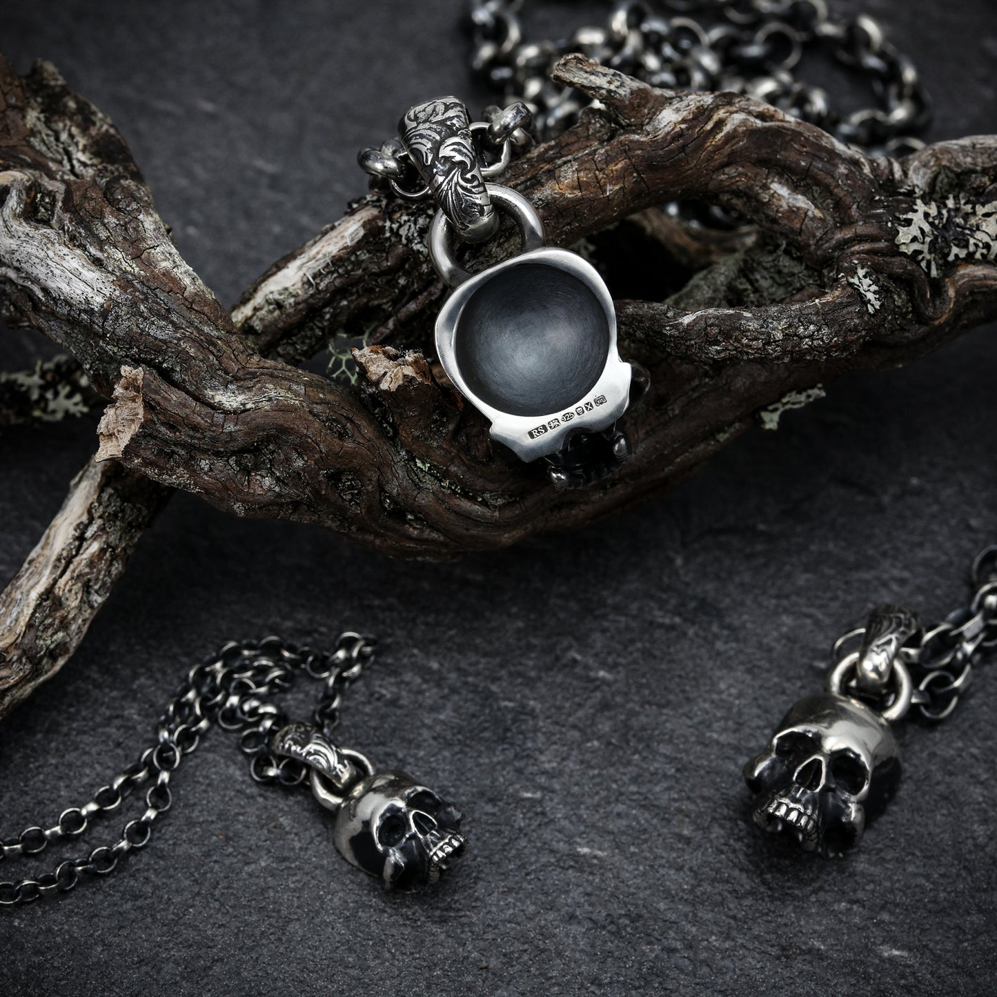 Hallmarked sterling silver skull necklace.