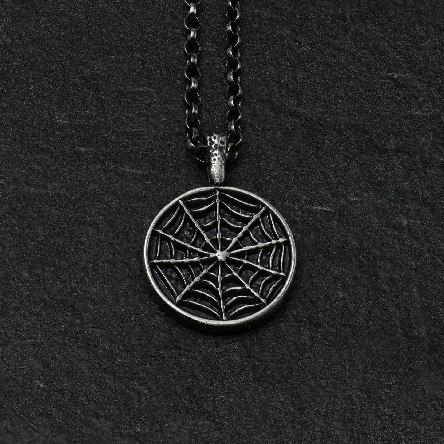 Mysterious and beautiful spider web necklace handcrafted from sterling silver.