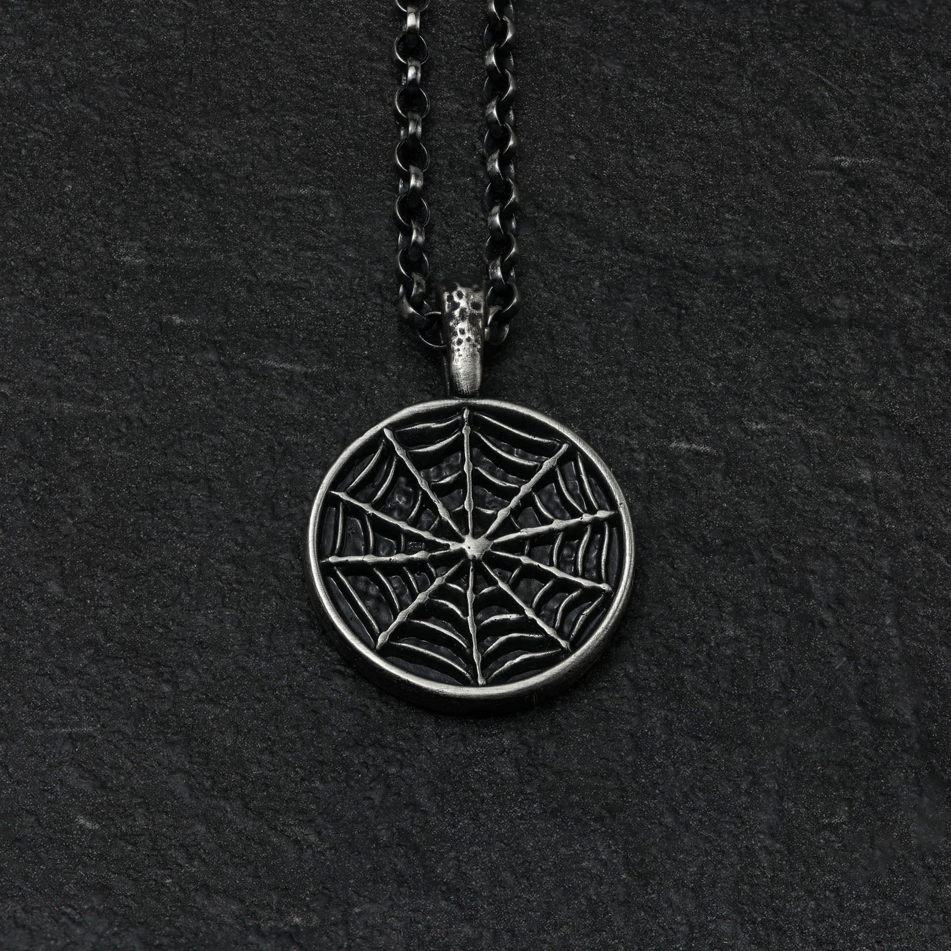 Mysterious and beautiful spider web necklace handcrafted from sterling silver.