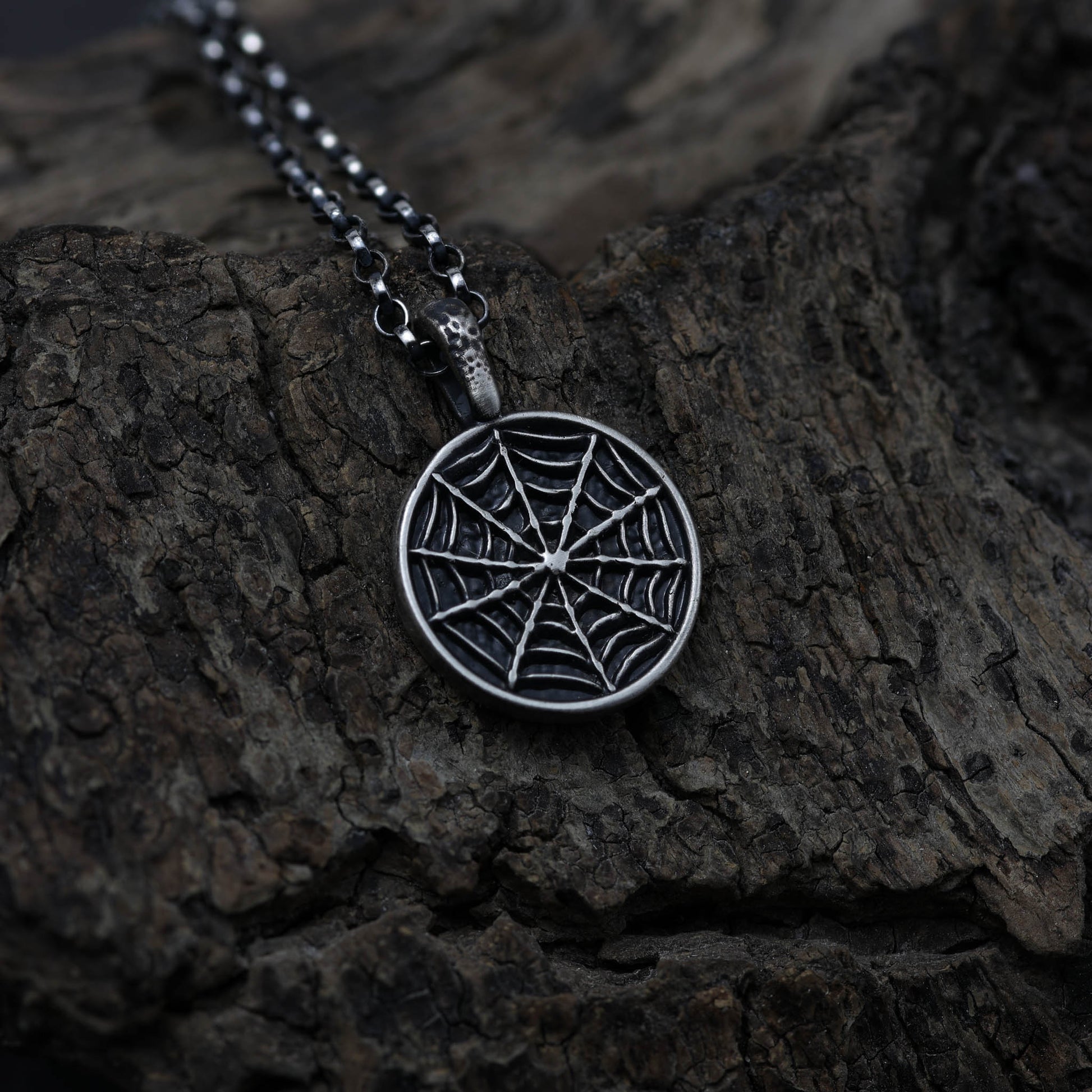 Witchy spider web necklace cast in a small workshop in Scotland.