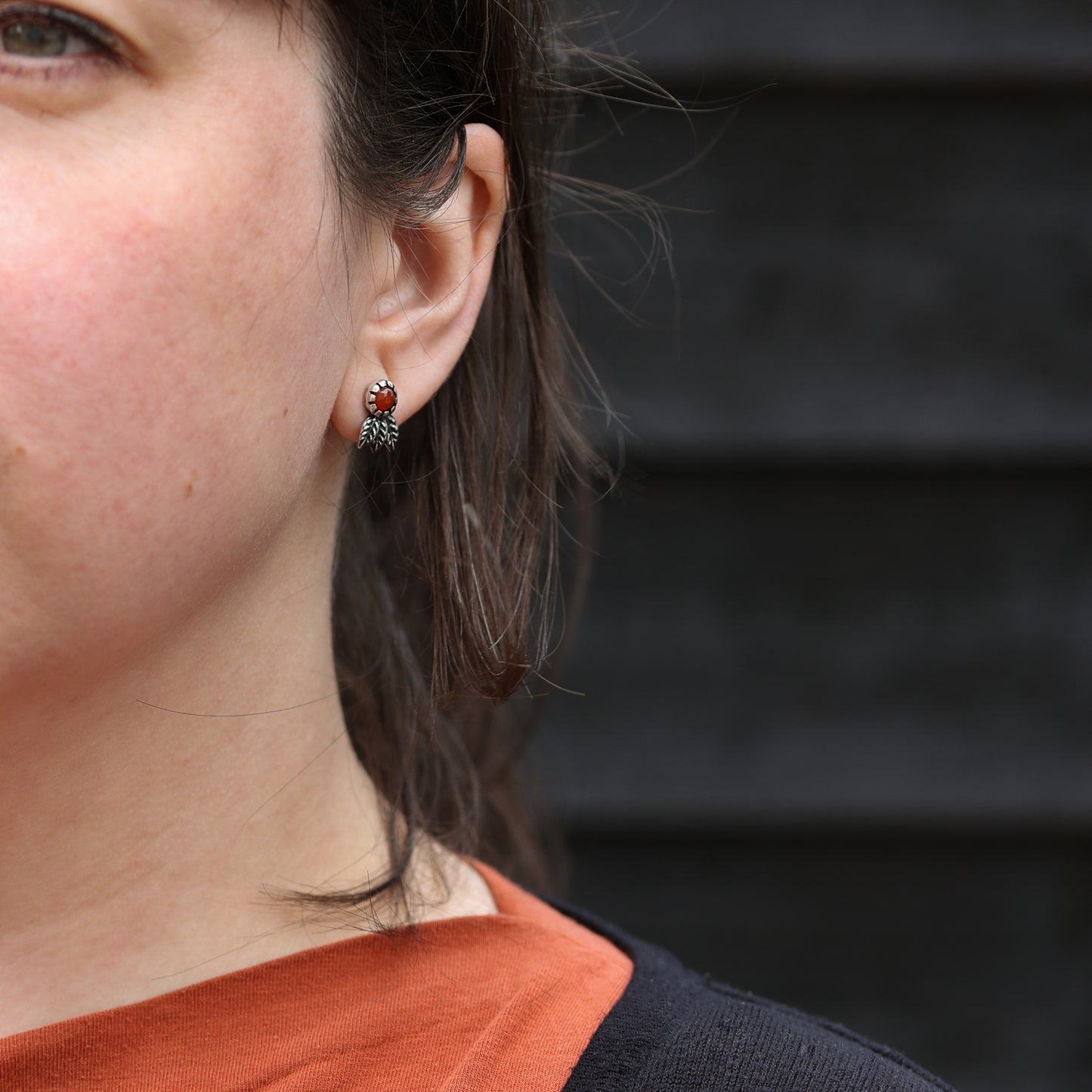 Stunning Carnelian gemstone earrings with sterling silver leaves, perfect for women who love to add a touch of nature-inspired elegance to their style