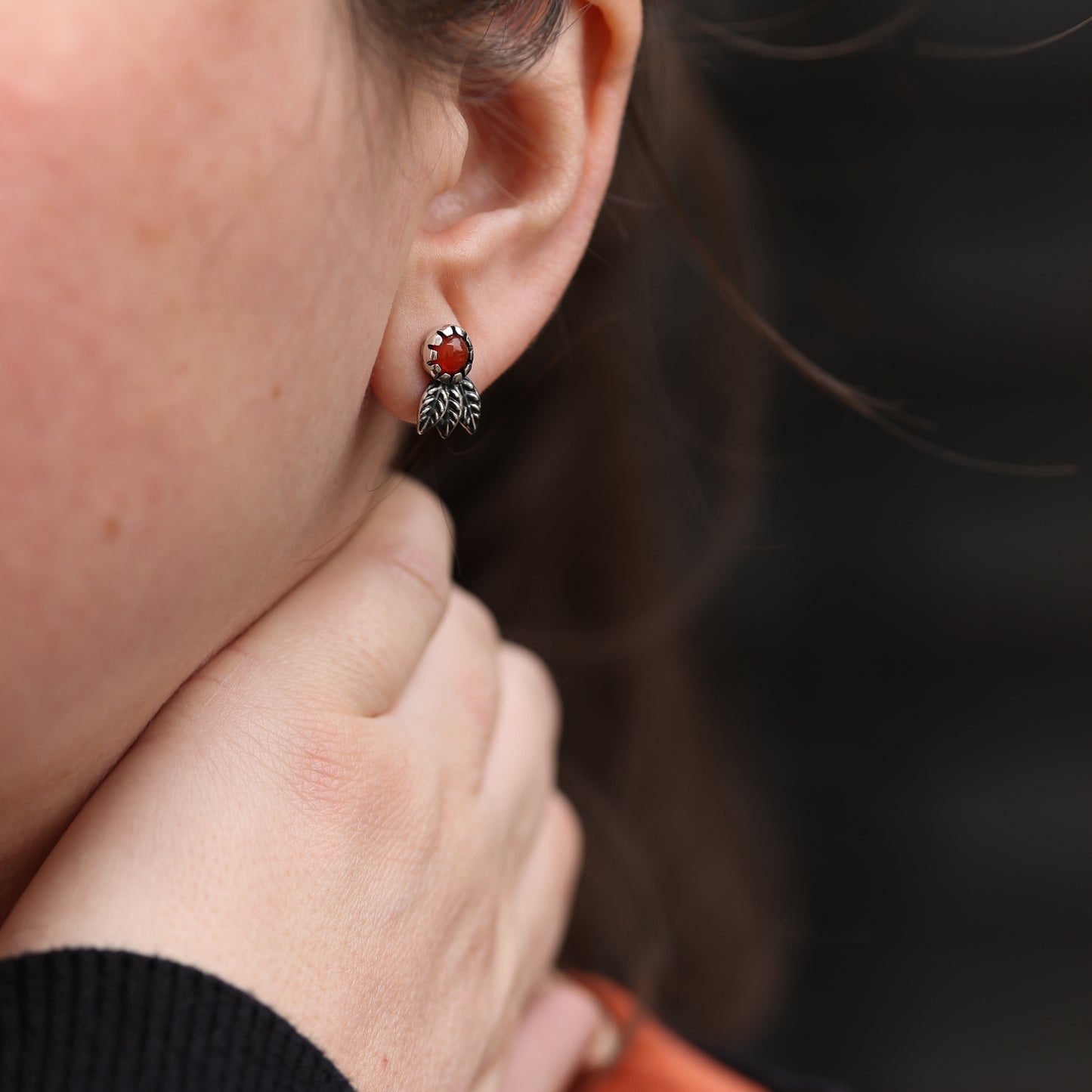 Nature-inspired leaf earrings with carnelian gemstones