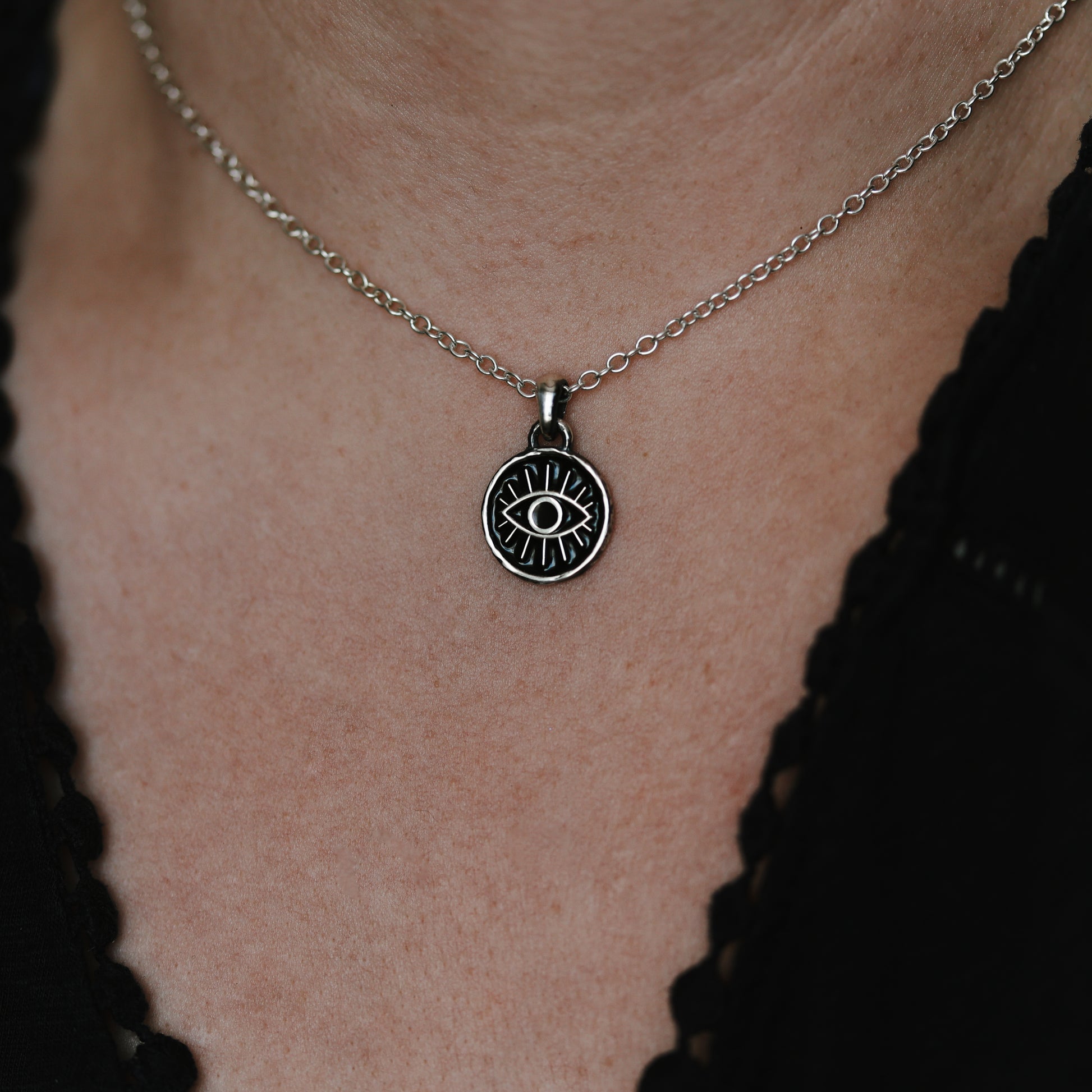 Third eye pendant necklace on a woman, perfect for witchy, dark cottagecore style loving person.