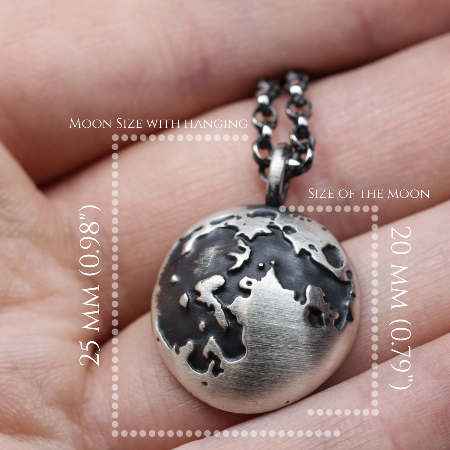 Sterling silver moon pendant.