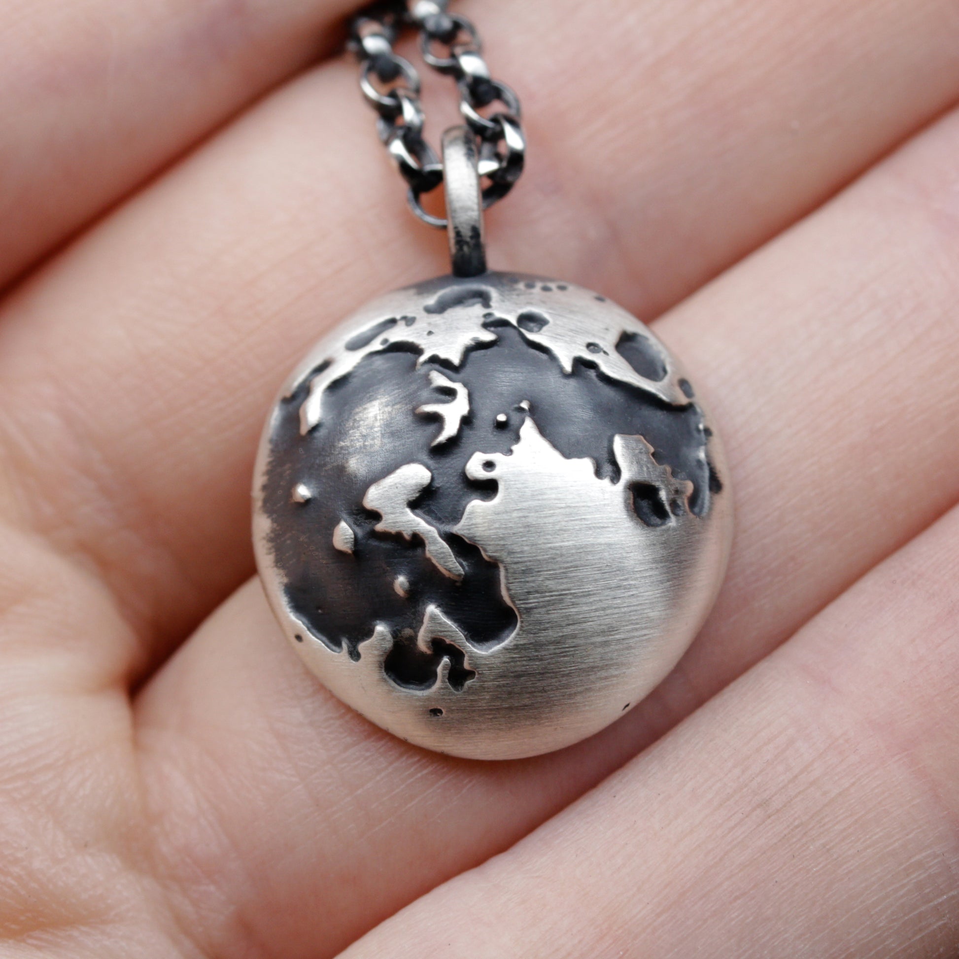 Full moon pendant necklace.