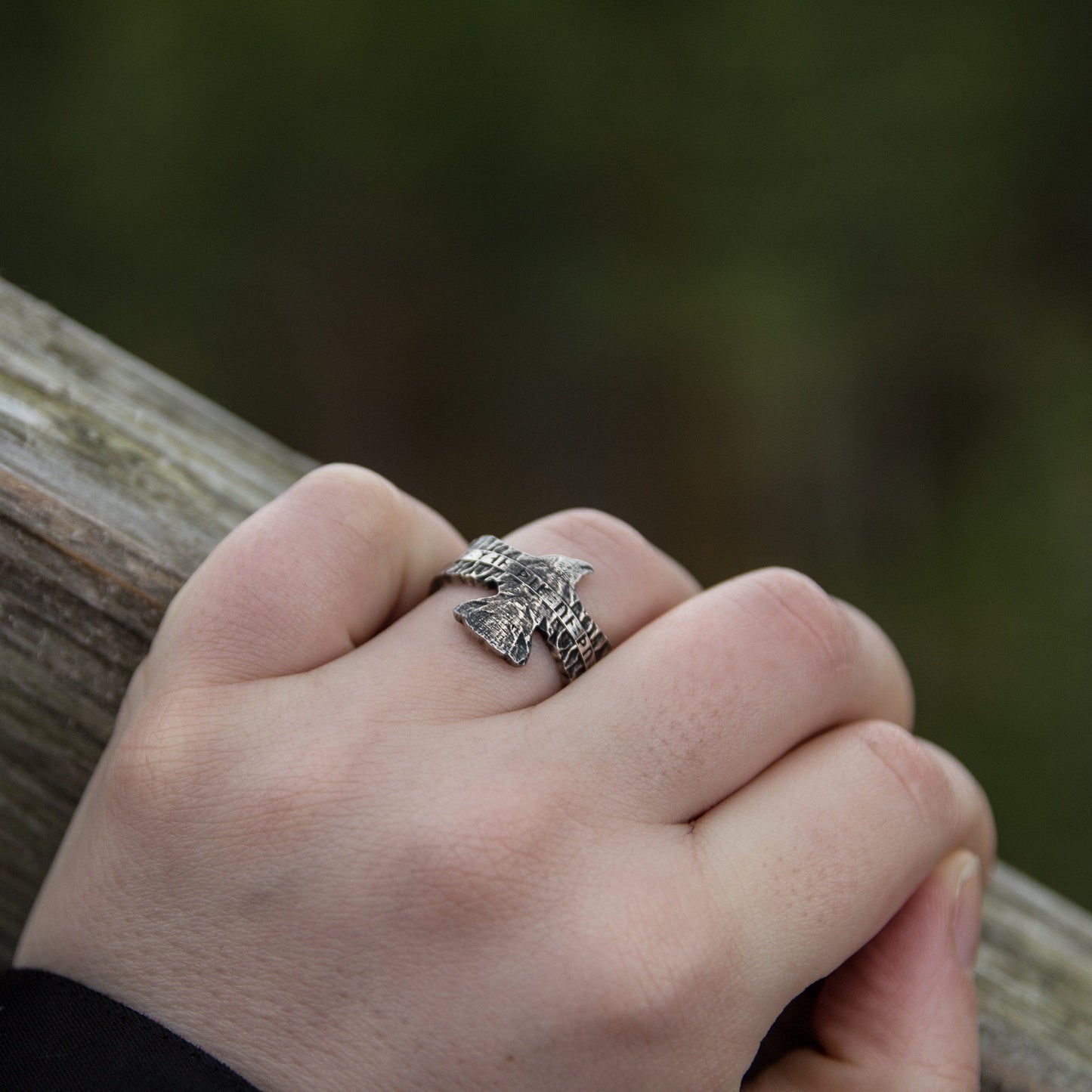 Raven ring.