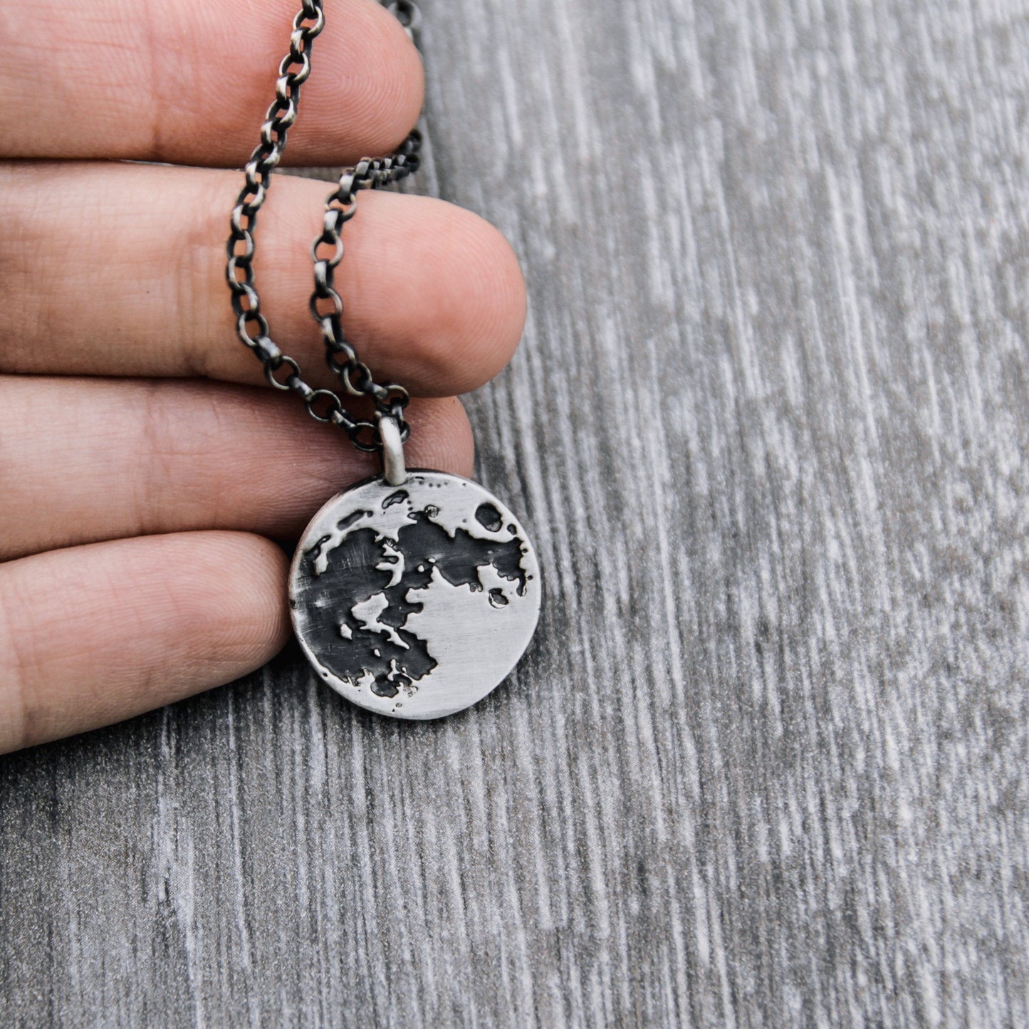 Full moon pendant necklace.