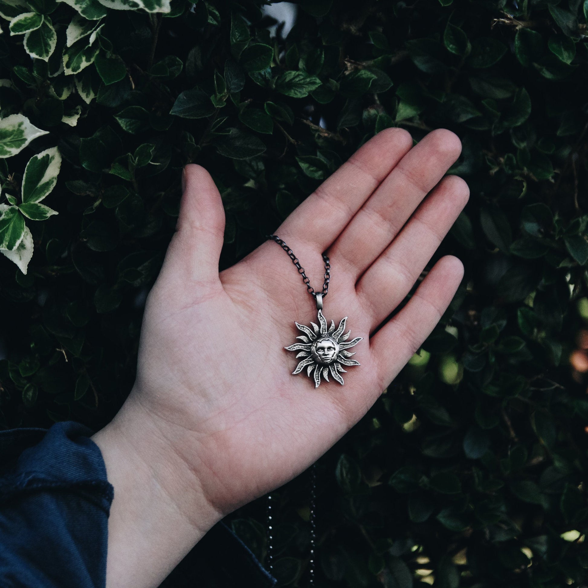 Sun face pendant necklace