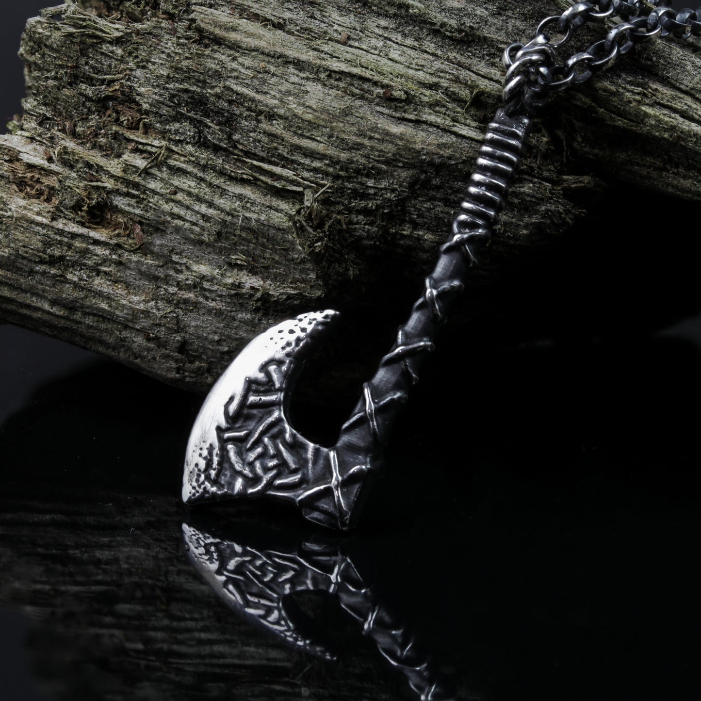 Celtic ornamented axe pendant necklace.